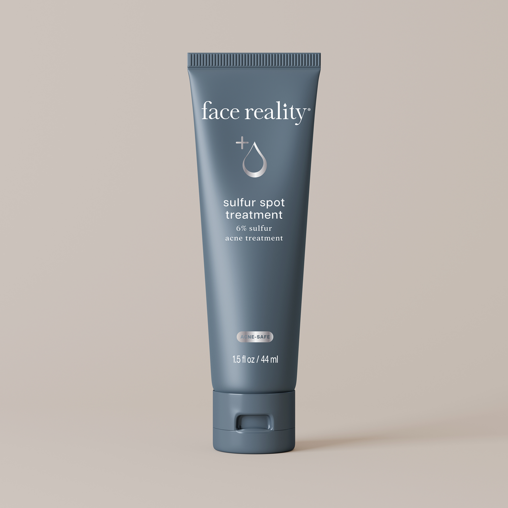 Tube of Face Reality sulfur spot treatment on a beige background