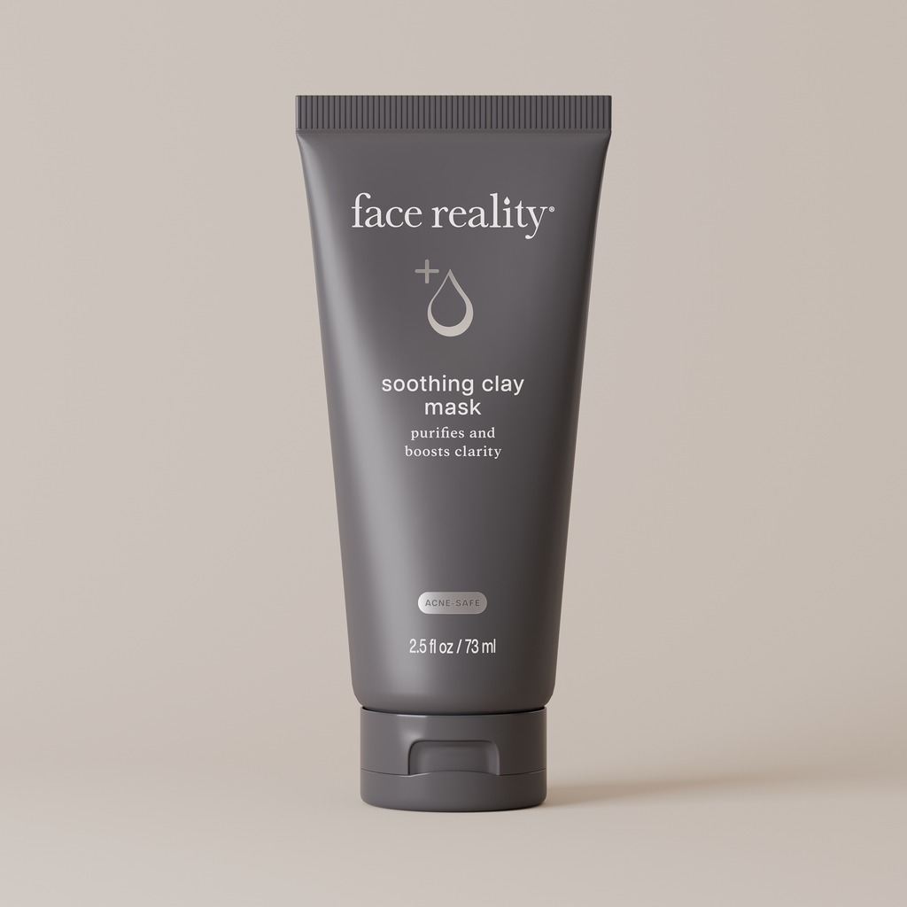 Dark Gray Tube of Face Reality soothing clay mask on a beige background