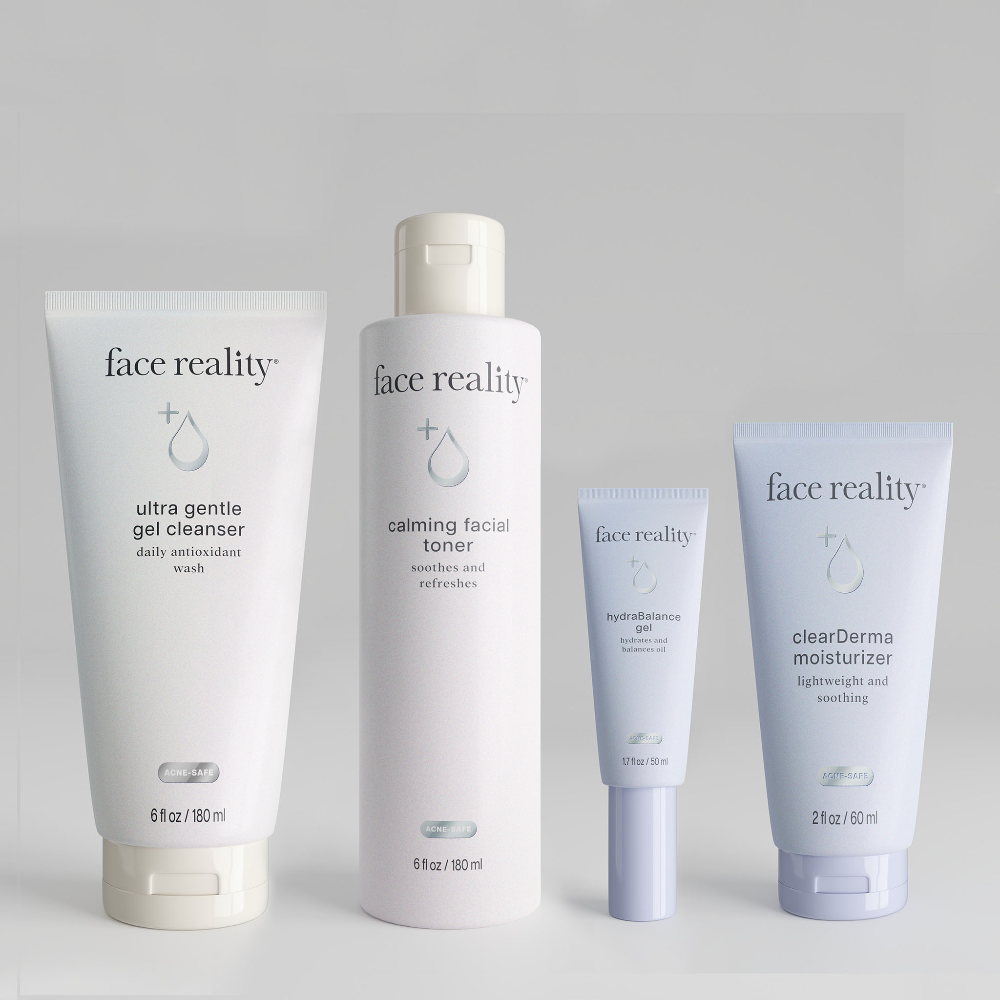 Face Reality products ultra gentle gel cleanser, calming facial toner, hydrabalance gel, and clearderma moisturizer standing side by side from left to right on a grey background.